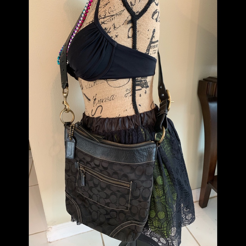 COACH BLACK LOGO CROSS BODY BAG. 10 1/2”x11x2 1/4”